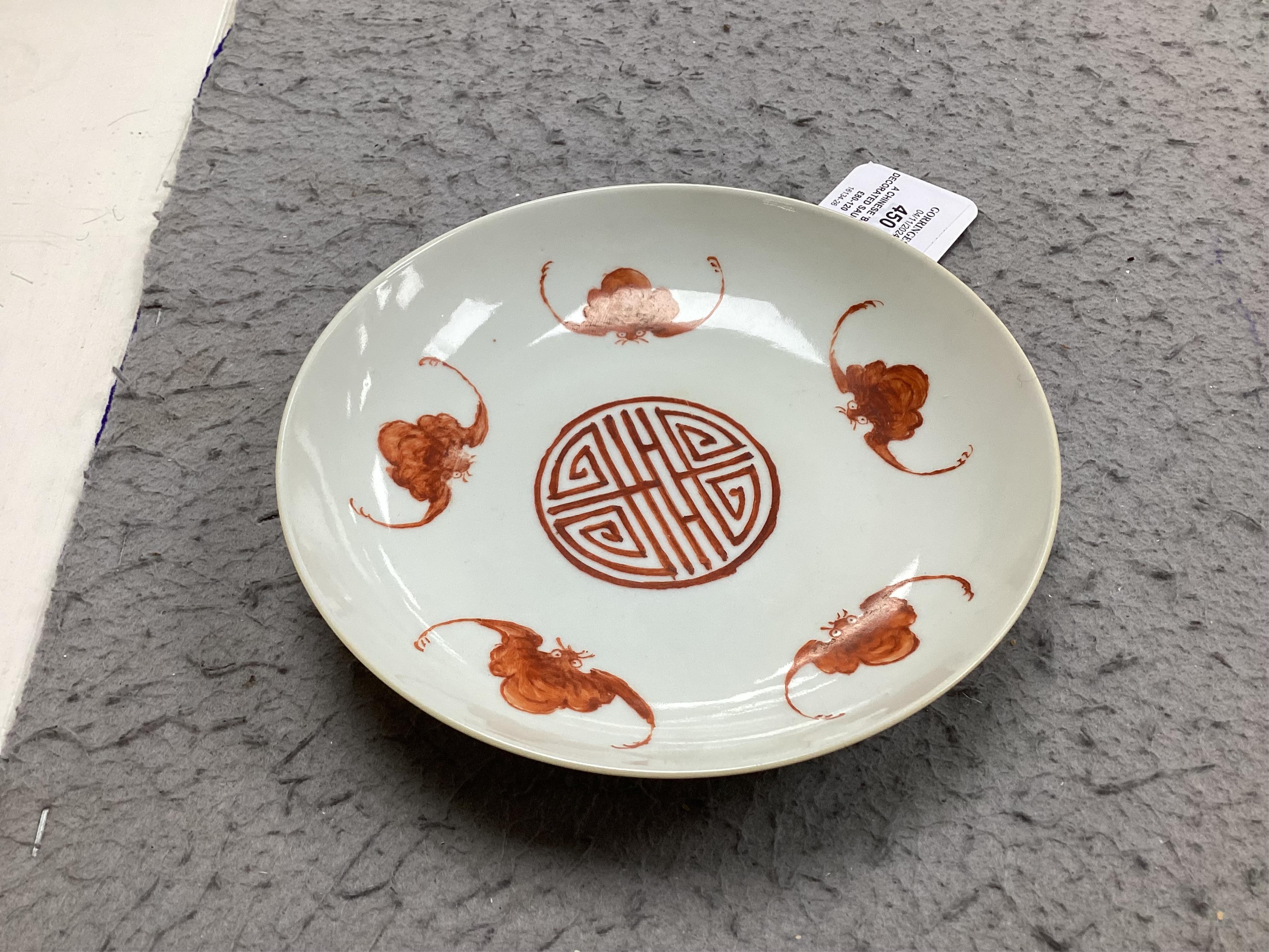 A Chinese ‘bats’ decorated saucer dish, Tongzhi mark and period, later decorated, 15cm in diameter. Condition - fair, stable but with hairline cracks